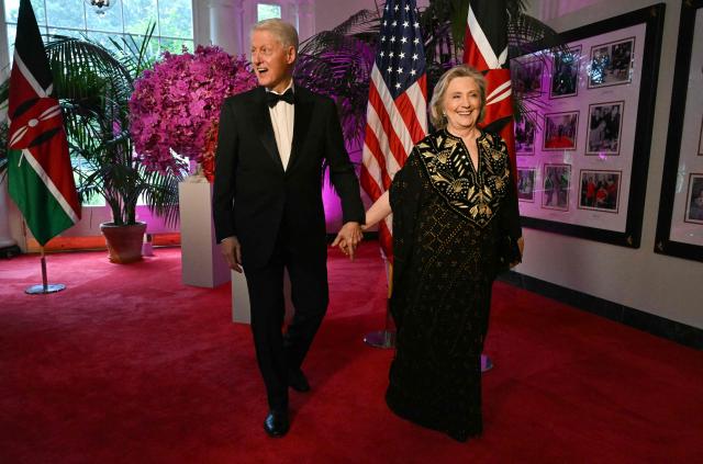 (FILES) Bill Clinton, 42nd US President and his wife Hillary Rodham Clinton, 67th US Secretary of State, arrive at the Booksellers Room of the White House on the occasion of the State Dinner with the Kenyan president at the White House in Washington, DC, on May 23, 2024. Bill and Hillary Clinton will testify in a US House investigation surrounding deceased sex offender Jeffrey Epstein, a spokesman for the ex-president said February 2, 2026, heading off a potential vote to hold the couple in contempt. They had originally refused to appear before lawmakers examining how authorities handled earlier investigations into the disgraced financier, who had connections and correspondence with the world's business and political elite. (Photo by SAUL LOEB / AFP)