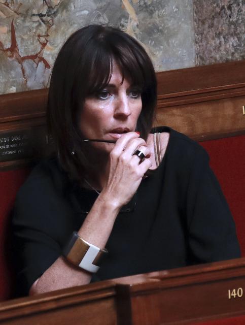 (FILES) Les Republicains righ-wing opposition party member of parliament and Toulouse deputy mayor, Laurence Arribage looks on during a session of questions to the government at the National Assembly in Paris on July 13, 2016. The Court of Appeal of the Palais de Justice Paris' courthouse on February 5, 2026 will issue its verdict in the appeal trial of former French MP Laurence Arribage for attempted political destabilization. (Photo by JACQUES DEMARTHON / AFP)