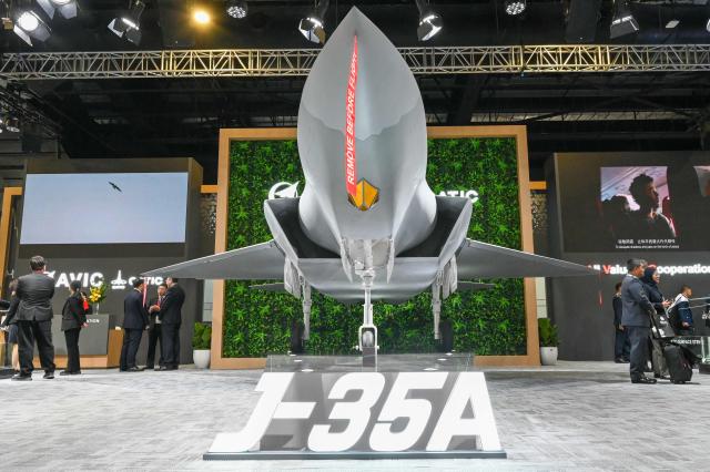 A model version of the J-35A stealth fighter jet is displayed at the Singapore Airshow in Singapore on February 3, 2026. (Photo by Roslan RAHMAN / AFP)