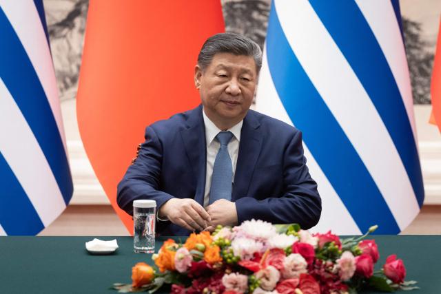 Chinese President Xi Jinping attends a signing ceremony with Uruguay's President Yamandu Orsi at the Great Hall of the People in Beijing on February 3, 2026. (Photo by JESSICA LEE / POOL / AFP)