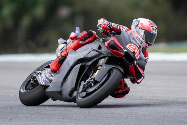 Ducati Lenovo Team's Spanish MotoGP rider Marc Marquez steers his bike during the first day of the 2026 MotoGP pre-season test at the Sepang International Circuit in Sepang on February 3, 2026. (Photo by Mohd Rasfan / AFP)