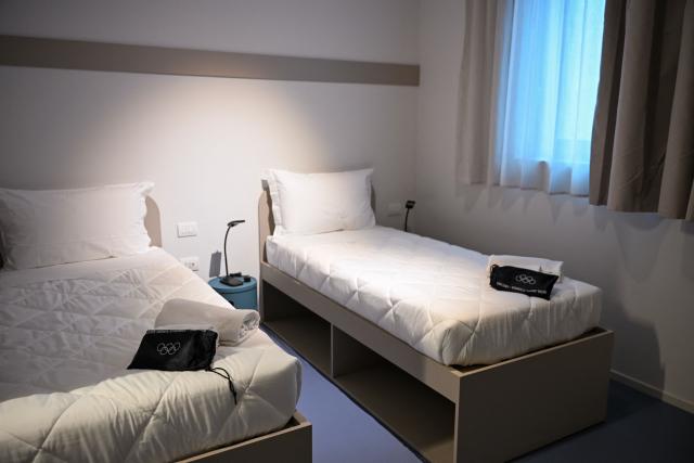 A standard double room for athletes is seen in the Team Italy quarters of the Olympic Village ahead of the Milano Cortina 2026 Winter Olympics in Milan on February 3, 2026. (Photo by PIERO CRUCIATTI / AFP)