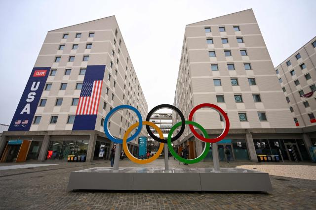 The Olympic rings are seen at the Olympic Village ahead of the Milano Cortina 2026 Winter Olympics in Milan on February 3, 2026. (Photo by PIERO CRUCIATTI / AFP)