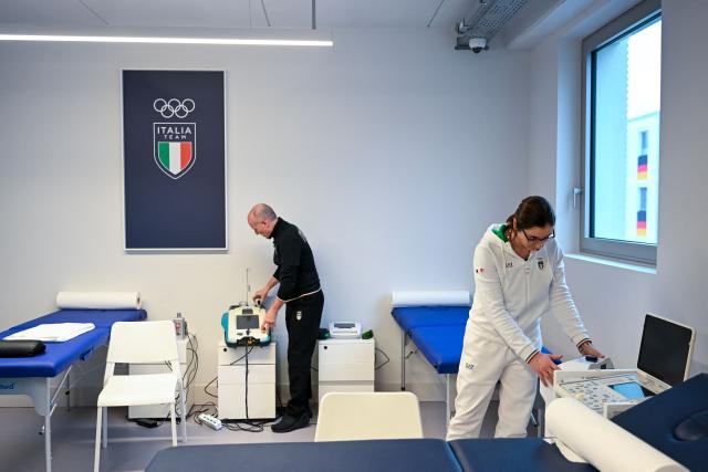 Physicians arrange equipment in the Team Italy quarters of the Olympic Village ahead of the Milano Cortina 2026 Winter Olympics in Milan on February 3, 2026. (Photo by PIERO CRUCIATTI / AFP)