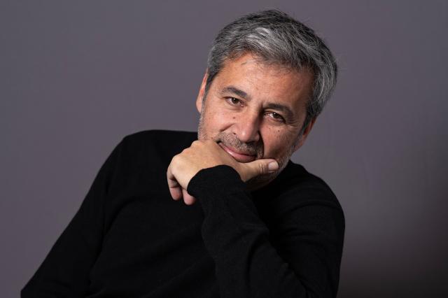 French former journalist Olivier Galzi, candidate in the Avignon upcoming municipal elections poses during a photo session in Avignon on February 2, 2026. (Photo by Miguel MEDINA / AFP)