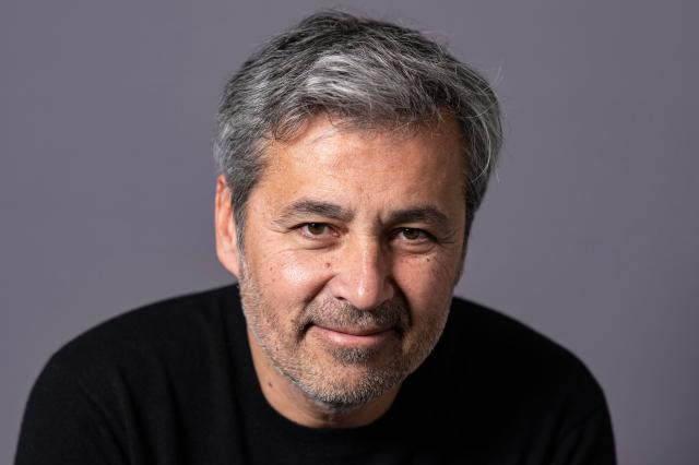 French former journalist Olivier Galzi, candidate in the Avignon upcoming municipal elections poses during a photo session in Avignon on February 2, 2026. (Photo by Miguel MEDINA / AFP)