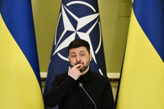 Ukraine's President Volodymyr Zelensky gestures as he delivers a press conference with Secretary General of NATO following their meeting in Kyiv on February 3, 2026, amid the Russian invasion in Ukraine. (Photo by Genya SAVILOV / AFP)