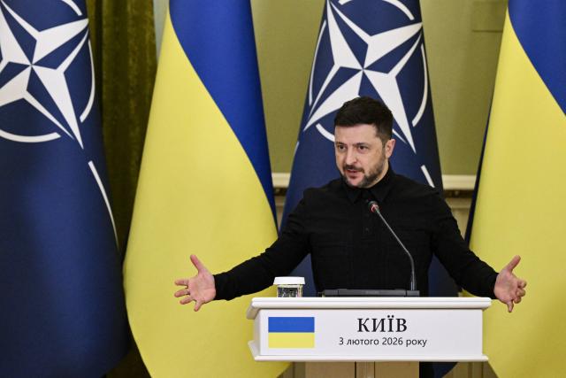 Ukraine's President Volodymyr Zelensky gestures as he delivers a press conference with Secretary General of NATO following their meeting in Kyiv on February 3, 2026, amid the Russian invasion in Ukraine. (Photo by Genya SAVILOV / AFP)