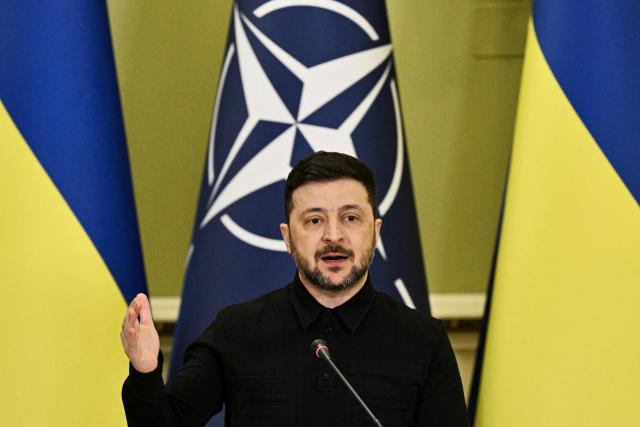 Ukraine's President Volodymyr Zelensky gestures as he delivers a press conference with Secretary General of NATO following their meeting in Kyiv on February 3, 2026, amid the Russian invasion in Ukraine. (Photo by Genya SAVILOV / AFP)