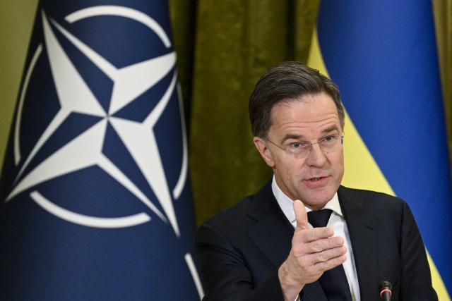 Secretary General of NATO Mark Rutte gestures as he delivers a press conference with Ukraine's President following their meeting in Kyiv on February 3, 2026, amid the Russian invasion in Ukraine. (Photo by Genya SAVILOV / AFP)