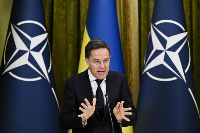 Secretary General of NATO Mark Rutte gestures as he delivers a press conference with Ukraine's President following their meeting in Kyiv on February 3, 2026, amid the Russian invasion in Ukraine. (Photo by Genya SAVILOV / AFP)
