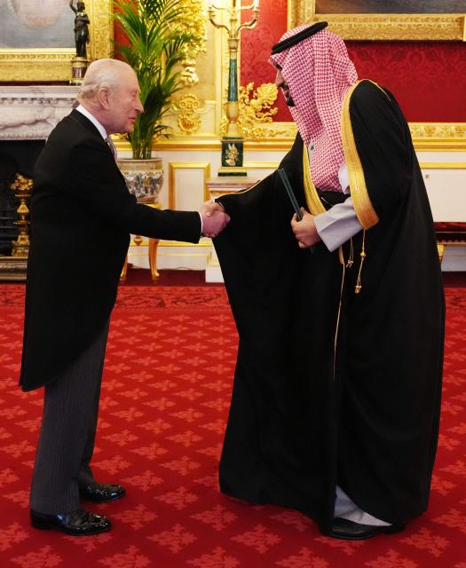 Britain's King Charles III (L) receives Prince Abdullah Bin Khaled Al Saud, Saudi Arabi's Ambassador to the United Kingdom, as he presents his credentials at St James's Palace in London on February 3, 2026. (Photo by Jonathan Brady / POOL / AFP)