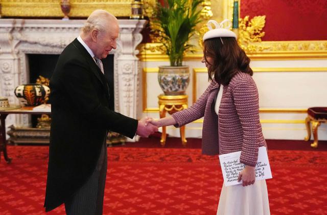 Britain's King Charles III (L) receives Laura Camila Sarabia Torres, Colombia's Ambassador to the United Kingdom, as she presents her credentials at St James's Palace in London on February 3, 2026. (Photo by Jonathan Brady / POOL / AFP)