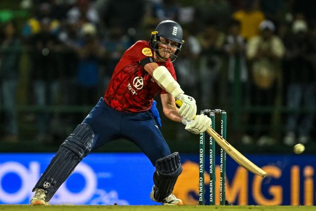 England's Sam Curran plays a shot during the third and final Twenty20 international cricket match between Sri Lanka and England at the Pallekele International Cricket Stadium in Kandy on February 3, 2026. (Photo by Ishara S. KODIKARA / AFP)