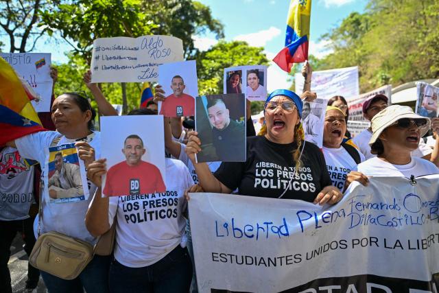 College students, unions and families of political prisoners call for full amnesty during a demonstration in Caracas on February 3, 2026. Venezuela's acting president Delci Rodriguez announced on January 30 a proposal for mass amnesty in the country, in her latest major reform since the US toppling of Nicolas Maduro just weeks ago. (Photo by Juan BARRETO / AFP)