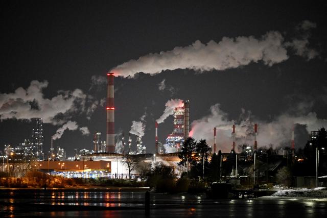 Steam rises from chimneys of the oil refinery in Gdansk, northern Poland on February 3, 2026. (Photo by Sergei GAPON / AFP)