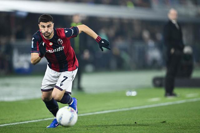 Bologna's Italian forward #07 Riccardo Orsolini (L) runs with the ball during the Italian Serie A football match between Bologna and AC Milan at the Renato Dall'Ara stadium in Bologna on February 3, 2026. (Photo by Andreas SOLARO / AFP)