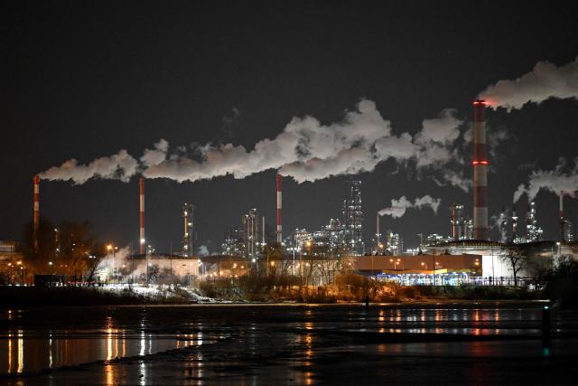 Steam rises from chimneys of the oil refinery in Gdansk, northern Poland on February 3, 2026. (Photo by Sergei GAPON / AFP)