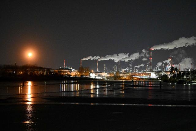 Steam rises from chimneys of the oil refinery in Gdansk, northern Poland on February 3, 2026. (Photo by Sergei GAPON / AFP)