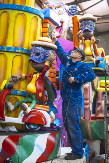 A member of a Carnival association prepares floats during preparations ahead of Carnival celebrations in Heerlen on February 3, 2026. (Photo by Marcel van Hoorn / ANP / AFP) / Netherlands OUT