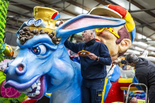 A member of a Carnival association prepares floats during preparations ahead of Carnival celebrations in Heerlen on February 3, 2026. (Photo by Marcel van Hoorn / ANP / AFP) / Netherlands OUT