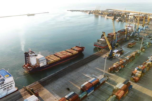 (FILES) The Turkish-flagged Moliva container ship, carrying hundreds of tonnes of possibly toxic industrial waste, enters the port of Durres, on November 8, 2024. The Durres Prosecutor's Office issued 33 arrest warrants on February 3, 2026 for suspected involvement in the trafficking of toxic waste that was turned away by Thailand. The waste left the Balkan nation in July 2024 in more than 100 containers. Thailand rejected the consignment following claims by an environmental group that it was illegal toxic waste. The shipment then returned to Albania. (Photo by ADNAN BECI / AFP)