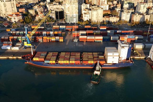 (FILES) The Turkish-flagged Moliva container ship, carrying hundreds of tonnes of possibly toxic industrial waste, enters the port of Durres, on November 8, 2024. The Durres Prosecutor's Office issued 33 arrest warrants on February 3, 2026 for suspected involvement in the trafficking of toxic waste that was turned away by Thailand. The waste left the Balkan nation in July 2024 in more than 100 containers. Thailand rejected the consignment following claims by an environmental group that it was illegal toxic waste. The shipment then returned to Albania. (Photo by ADNAN BECI / AFP)