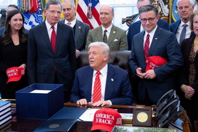 US President Donald Trump, surrounded by members of Congress, speaks with the media after signing a funding bill to end a partial government shutdown in the Oval Office of the White House in Washington, DC, February 3, 2026. The US House of Representatives passed a spending bill on Tuesday ending the four-day partial government shutdown sparked by Democratic opposition to funding for the federal agency carrying out President Donald Trump's immigration crackdown. (Photo by SAUL LOEB / AFP)