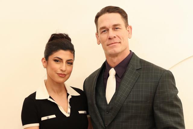 US actor John Cena (R) and wife Shay Shariatzadeh attend the Apple TV+ Press Day in Santa Monica, California, on February 3, 2026. (Photo by VALERIE MACON / AFP)