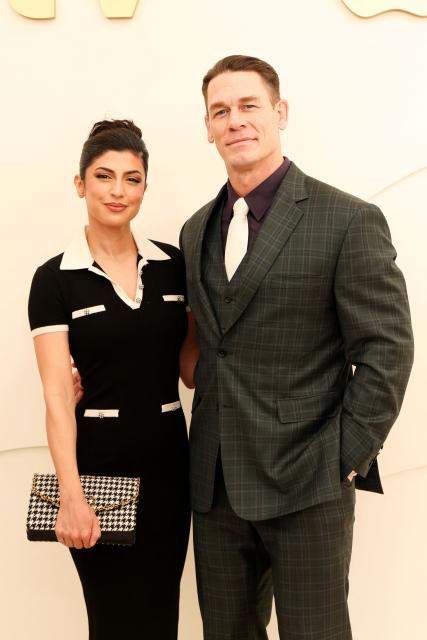 US actor John Cena (R) and wife Shay Shariatzadeh attend the Apple TV+ Press Day in Santa Monica, California, on February 3, 2026. (Photo by VALERIE MACON / AFP)