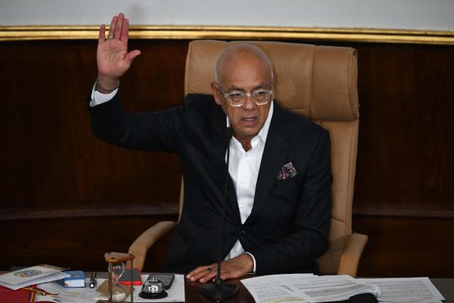 The President of the National Assembly of Venezuela, Jorge Rodriguez, votes during a National Assembly session in Caracas on February 3, 2026. Thousands of backers of Venezuela's former leader Nicolas Maduro, who was ousted in a deadly US military operation, marched in Caracas on February 3 to demand his freedom. (Photo by Federico PARRA / AFP)