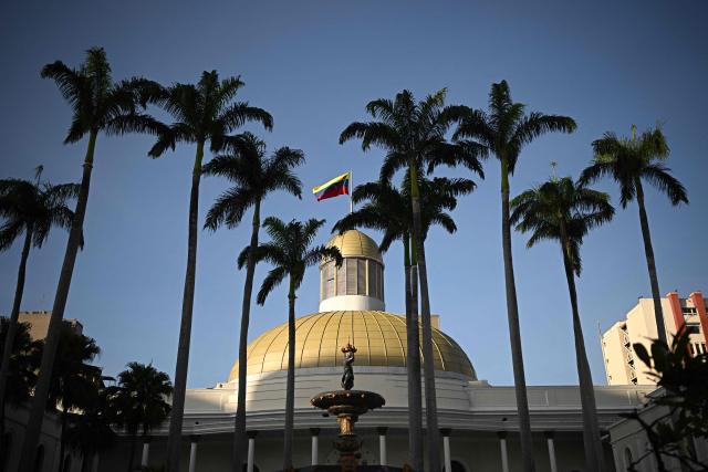 TOPSHOT - Venezuela's National Assembly building is pictured in Caracas on February 3, 2026. Thousands of backers of Venezuela's former leader Nicolas Maduro, who was ousted in a deadly US military operation, marched in Caracas on February 3 to demand his freedom. (Photo by Federico PARRA / AFP)