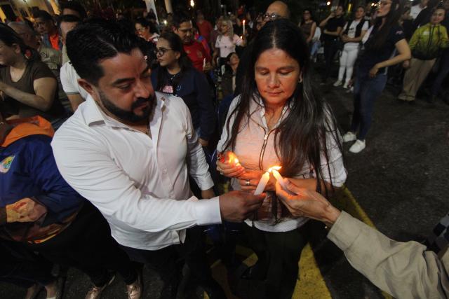 Supporters of ousted President Nicolas Maduro take part in a vigil in San Cristobal, Tachira state, on February 3, 2026. Thousands of backers of Venezuela's former leader Nicolas Maduro, who was ousted in a deadly US military operation, marched in Caracas on February 3 to demand his freedom. (Photo by JOHNNY PARRA / AFP)