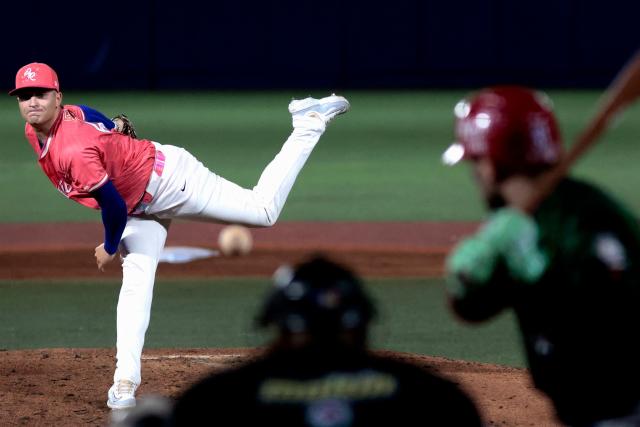 Cangrejeros de Santurce's #44 Jordan Morales pitches in the fourth inning of the Caribbean Series baseball tournament sixth game between Mexico's Charros de Jalisco and Puerto Rico's Cangrejeros de Santurce at the Panamerican Stadium in Jalisco, Mexico, on February 3, 2026. (Photo by Ulises Ruiz / AFP)
