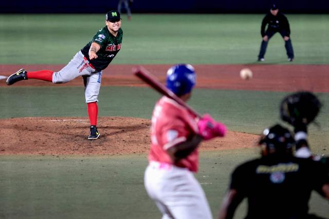 Charros de Jalisco's #45 Luis Fernando Miranda pithces in the fourth inning of the Caribbean Series baseball tournament sixth game between Mexico's Charros de Jalisco and Puerto Rico's Cangrejeros de Santurce at the Panamerican Stadium in Jalisco, Mexico, on February 3, 2026. (Photo by Ulises Ruiz / AFP)