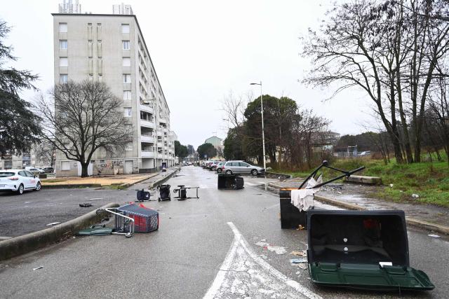 This photograph shows the Cevennes district in Ales, southern France on January 22, 2026, during a visit of drug dealing spots by French prosecutors. "The street sweeper can no longer come to clean, and at night there is gunfire": for this Alès resident, the arrival of the Marseille-based DZ Mafia criminal group in this small Gard town, as elsewhere in France, makes life increasingly unbearable.

"If the mayor wants us to vote for him in the neighborhood, he has to eradicate this problem", said this woman who requested anonymity just a few weeks before the municipal elections at the foot of her building where tags display the price per gram of cannabis or cocaine. (Photo by Sylvain THOMAS / AFP)