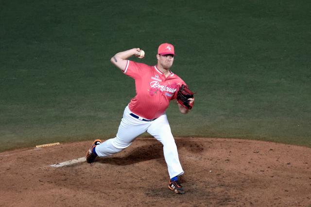 Cangrejeros de Santurce's #35 Derek West pitches in the ninth inning of the Caribbean Series baseball tournament sixth game between Mexico's Charros de Jalisco and Puerto Rico's Cangrejeros de Santurce at the Panamerican Stadium in Jalisco, Mexico, on February 3, 2026. (Photo by Ulises Ruiz / AFP)