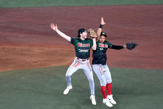 Players of Charros de Jalisco celebrate at the end of the ninth inning of the Caribbean Series baseball tournament sixth game between Mexico's Charros de Jalisco and Puerto Rico's Cangrejeros de Santurce at the Panamerican Stadium in Jalisco, Mexico, on February 3, 2026. (Photo by Ulises Ruiz / AFP)