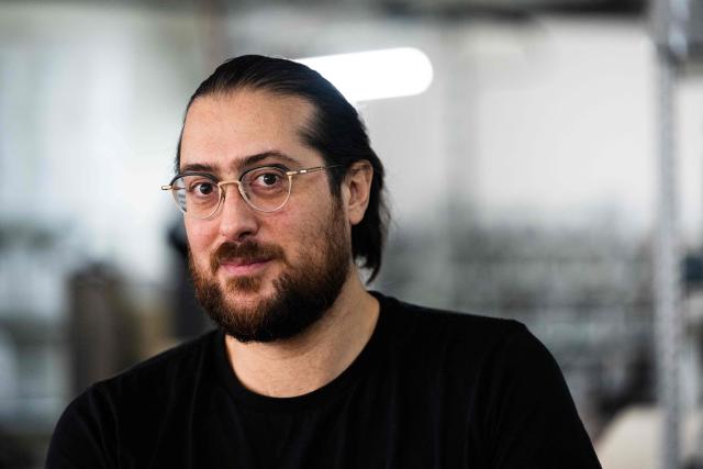 President of the FIVAPE (French Interprofessional Federation of Vaping) and co-founder and CEO of Fuu Jean Moiroud poses at the Fuu factory, a brand creating and manufacturing e-liquid for electronic cigarettes, in Paris on February 3, 2026. (Photo by Julie SEBADELHA / AFP)