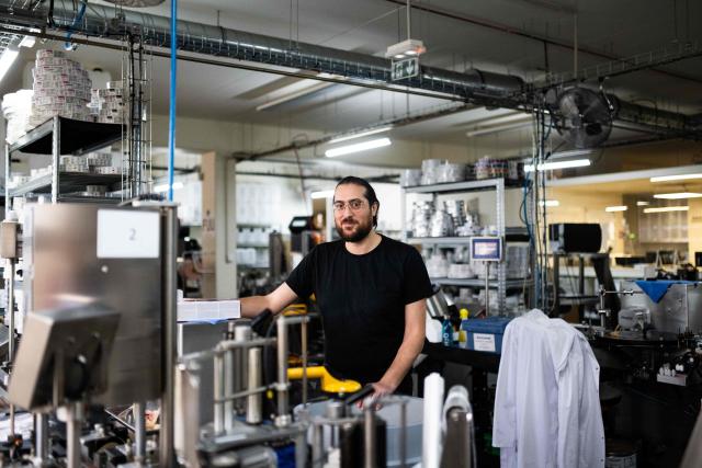 President of the FIVAPE (French Interprofessional Federation of Vaping) and co-founder and CEO of Fuu Jean Moiroud poses at the Fuu factory, a brand creating and manufacturing e-liquid for electronic cigarettes, in Paris on February 3, 2026. (Photo by Julie SEBADELHA / AFP)