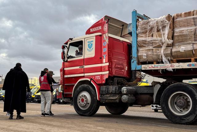 A humanitarian aid truck enters through the Egyptian side of the Rafah border crossing with the Gaza Strip on February 4, 2026, days after Israel permitted a limited reopening of the Palestinian territory's border post. The crossing, which is Gaza's only gateway to the outside world that does not lead to Israel, had been largely closed since Israeli forces seized control of it in May 2024 during the war with Hamas. (Photo by AFP)