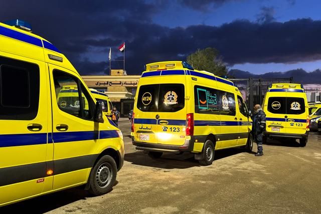 Ambulances wait on the Egyptian side of the Rafah border crossing with the Gaza Strip on February 4, 2026, days after Israel permitted a limited reopening of the Palestinian territory's border post. The crossing, which is Gaza's only gateway to the outside world that does not lead to Israel, had been largely closed since Israeli forces seized control of it in May 2024 during the war with Hamas. (Photo by AFP)