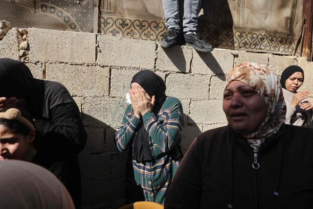 EDITORS NOTE: Graphic content / Women mourn during the funeral of Saeed Nael al-Sheikh, a 24-year-old Palestinian who was reportedly killed by Israeli forces, in the city of Jericho in the Israeli-occupied West Bank on February 4, 2026. Palestinian health officials said on February 3, that Israeli forces shot dead a Palestinian man and wounded three others in the occupied West Bank city of Jericho. The Israeli military said soldiers opened fire after "rocks" were thrown at them. (Photo by AHMAD GHARABLI / AFP)
