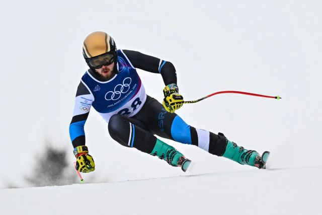 Israel's Barnabas Szollos competes in the first official training for the men's downhill alpine skiing event ahead of the Milano Cortina 2026 Winter Olympic Games at the Stelvio Ski Centre in Bormio (Valtellina) on February 4, 2026. (Photo by Fabrice COFFRINI / AFP)