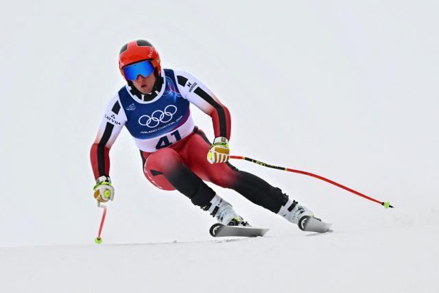 Latvia's Elvis Opmanis competes in the first official training for the men's downhill alpine skiing event ahead of the Milano Cortina 2026 Winter Olympic Games at the Stelvio Ski Centre in Bormio (Valtellina) on February 4, 2026. (Photo by Fabrice COFFRINI / AFP)