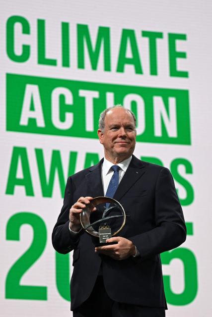 Prince Albert II of Monaco attends a ceremony to announce the winners of Climate Action Awards 2025 by International Olympic Committee (IOC) ahead of the Milano Cortina 2026 Winter Olympic Games, in Milan on February 4, 2026. (Photo by Piero CRUCIATTI / AFP)