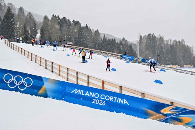 Athletes train ahead of the cross-country events of the Milano Cortina 2026 Winter Olympic Games at Tesero Cross-Country Skiing Stadium in Lago di Tesero (Val di Fiemme) on February 4, 2026. (Photo by JAVIER SORIANO / AFP)