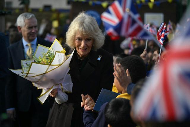 Britain's Queen Camilla departs after attending the opening of a library at Christ Church Primary School in London on February 4, 2026, to help mark the "National Year of Reading" and meet with pupil librarians. (Photo by JUSTIN TALLIS / POOL / AFP)