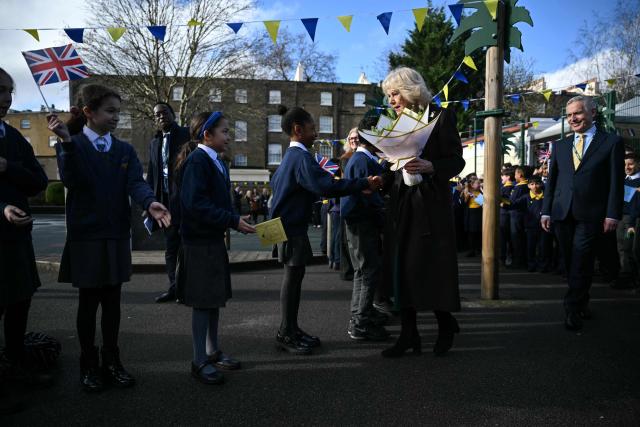 Britain's Queen Camilla departs after attending the opening of a library at Christ Church Primary School in London on February 4, 2026, to help mark the "National Year of Reading" and meet with pupil librarians. (Photo by JUSTIN TALLIS / POOL / AFP)