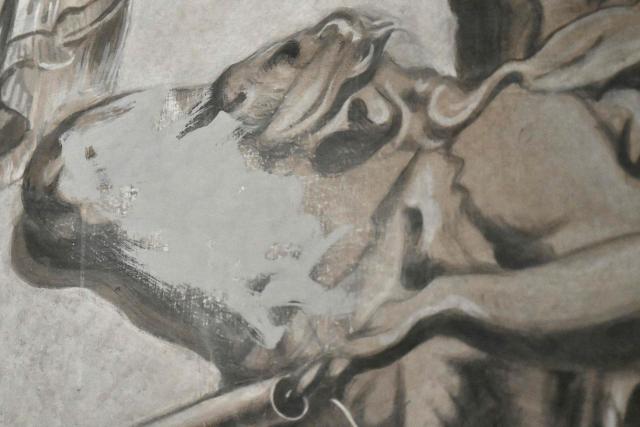 A picture shows a newly restored fresco in the Basilica of San Lorenzo in Lucina where an angel was erased after a controversy, in Rome on February 4, 2026. The newly restored angel painted by Bruno Valentini was looking alike Italy's Prime Minister Giorgia Meloni and the author himlsel erased it on the request of the Vatican according to Italian newspaper La Republicca. (Photo by Alberto PIZZOLI / AFP)